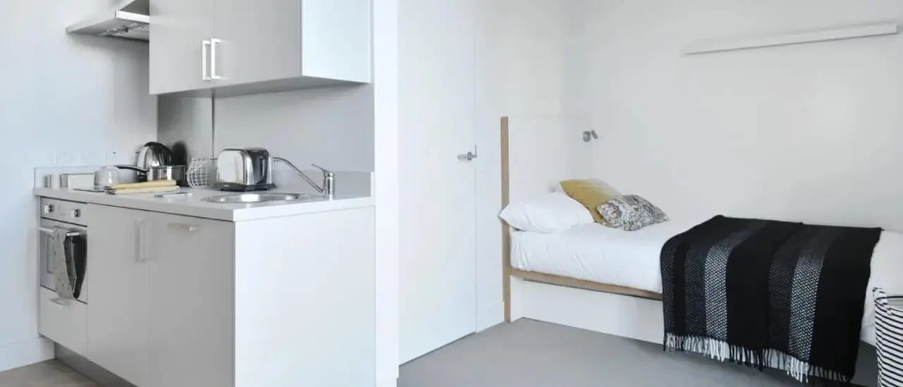 Kitchenette with bed in room bedroom at Victoria Hall Kings Cross in London Student Accommodation