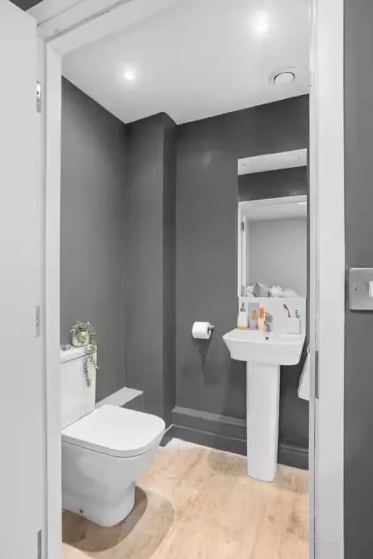 Toilet sink and mirror bathroom at Alwyn Court in Cardiff Student Accommodation