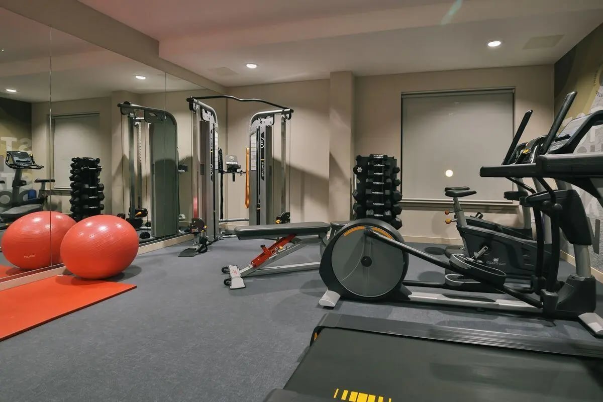 Elliptical bike weight rack exercise balls gym area at Bath Street in Glasgow Student Accommodation