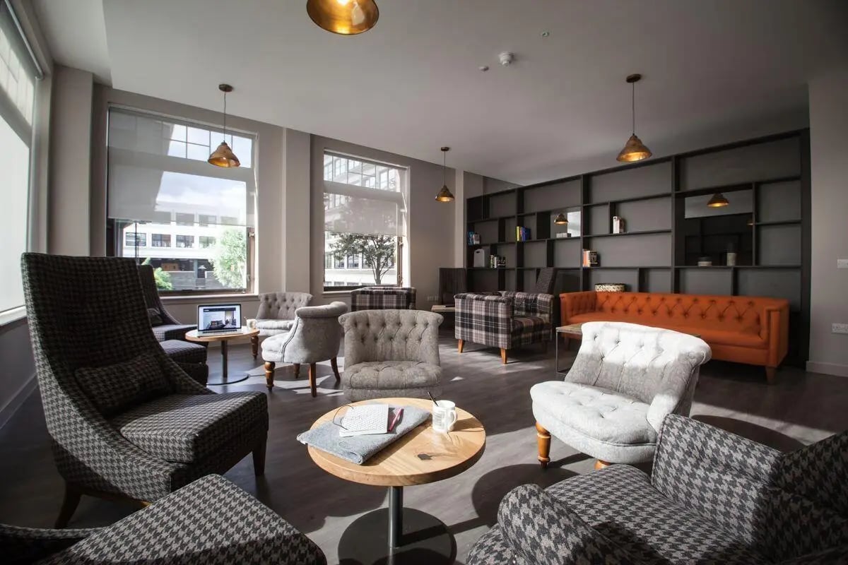 Seating and shelves in a communal living area at Bath Street in Glasgow Student Accommodation
