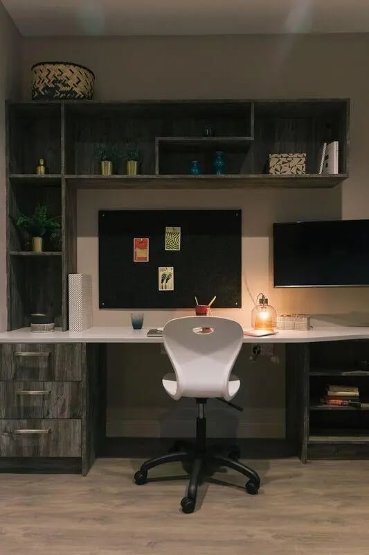 Desk with chair monitor and shelves study area at Bath Street in Glasgow Student Accommodation