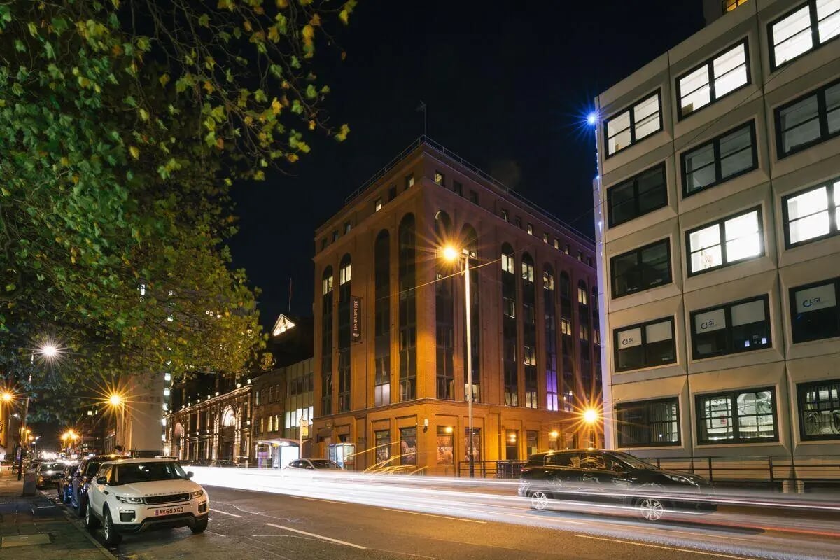 Street view with buildings and light trails exterior at Bath Street in Glasgow Student Accommodation