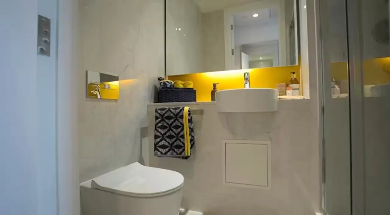 Toilet sink and patterned towels bathroom at Riverside Glasgow in Glasgow Student Accommodation