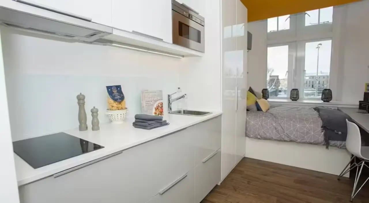 Modern studio kitchen and bed area bedroom at Riverside Glasgow in Glasgow Student Accommodation