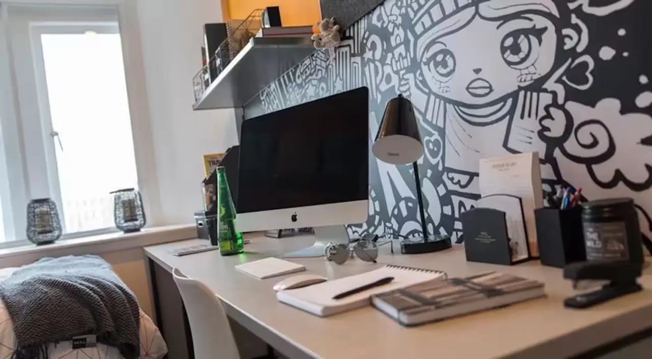Desk with computer and bedding study area at Riverside Glasgow in Glasgow Student Accommodation