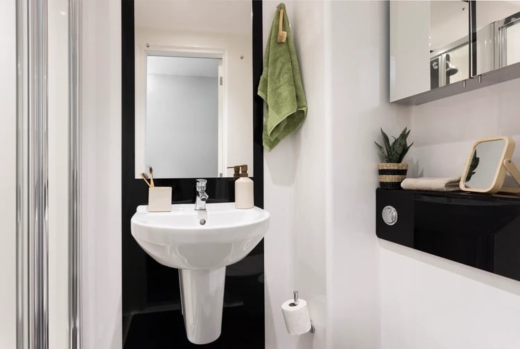 Sink toothbrush holder soap dispenser towel toilet Bathroom at Newgate Court in Newcastle Upon Tyne Student Accommodation