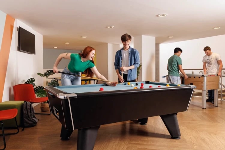 Billiard and foosball tables people playing Image Type at Newgate Court in Newcastle Upon Tyne Student Accommodation