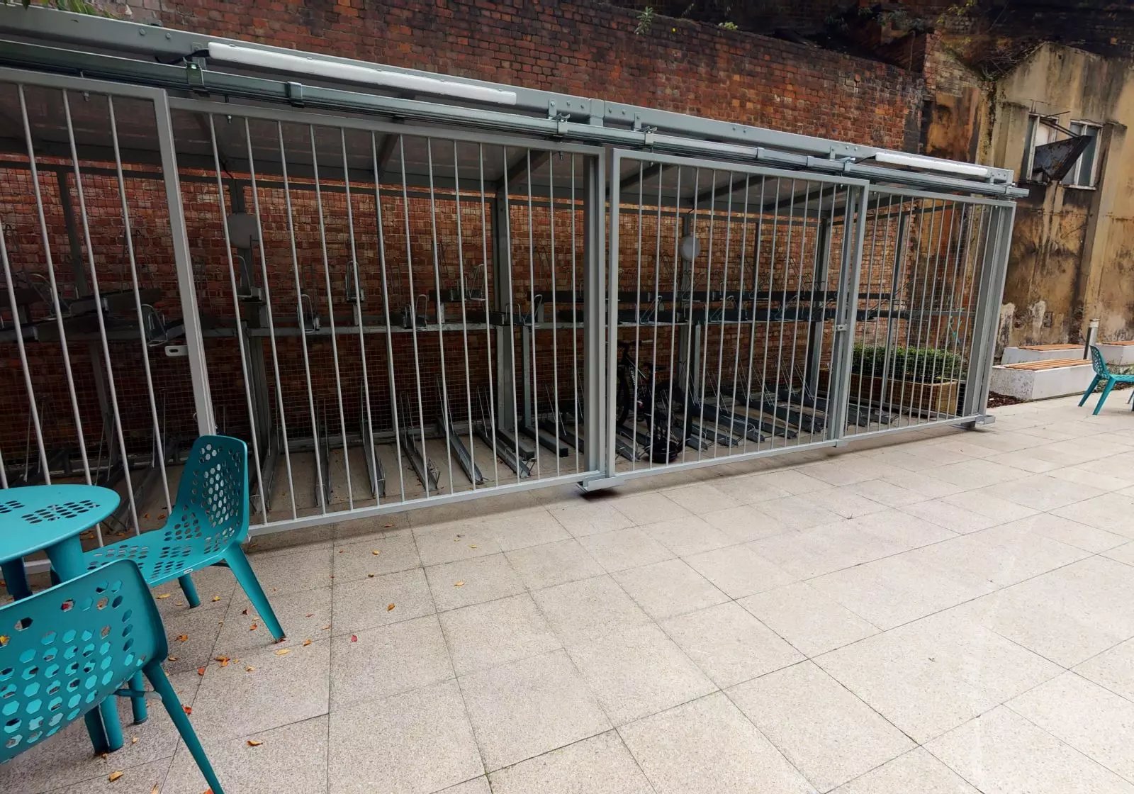 Bike racks and outdoor seating exterior at iQ Bankside in London Student Accommodation