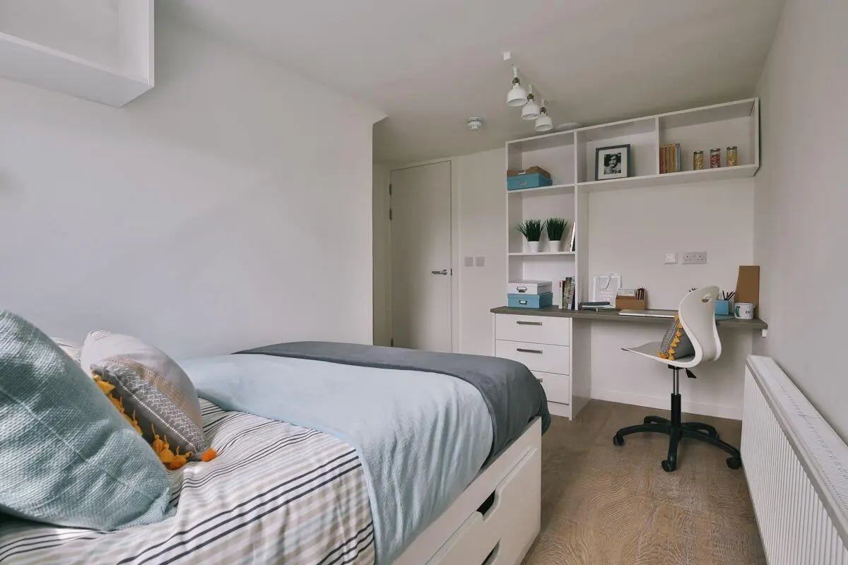 Bed desk shelves and chair bedroom at Claremont Place in Newcastle Upon Tyne Student Accommodation