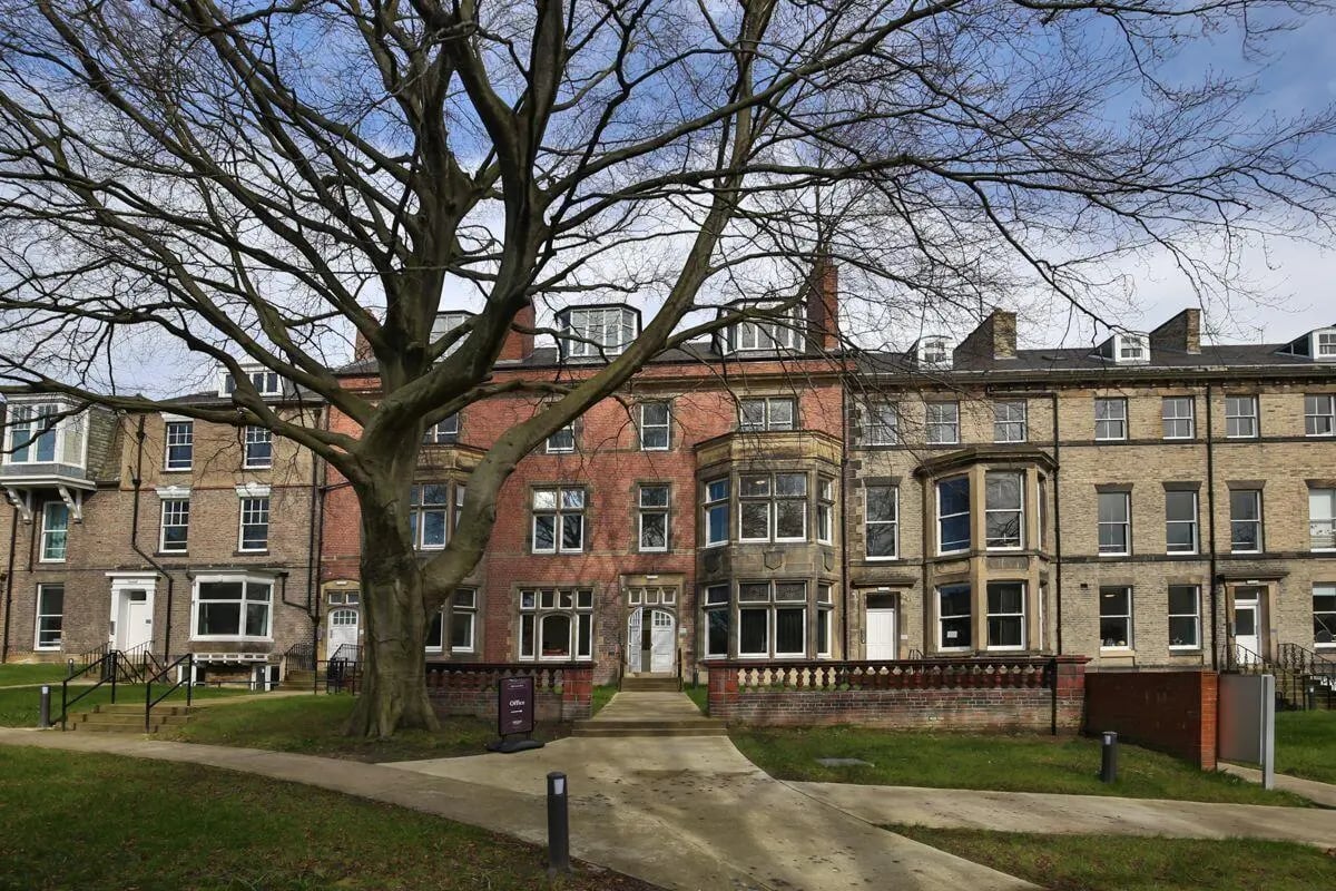 Terraced student houses with bay windows exterior at Claremont Place in Newcastle Upon Tyne Student Accommodation