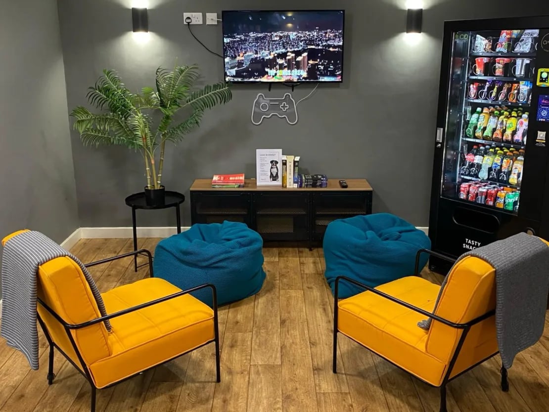 Two yellow chairs beanbags vending machine living room at Europa in Liverpool Student Accommodation