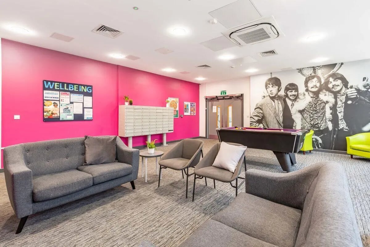 Pool table sofas chairs Beatles mural common room at Glassworks - Liverpool in Liverpool Student Accommodation