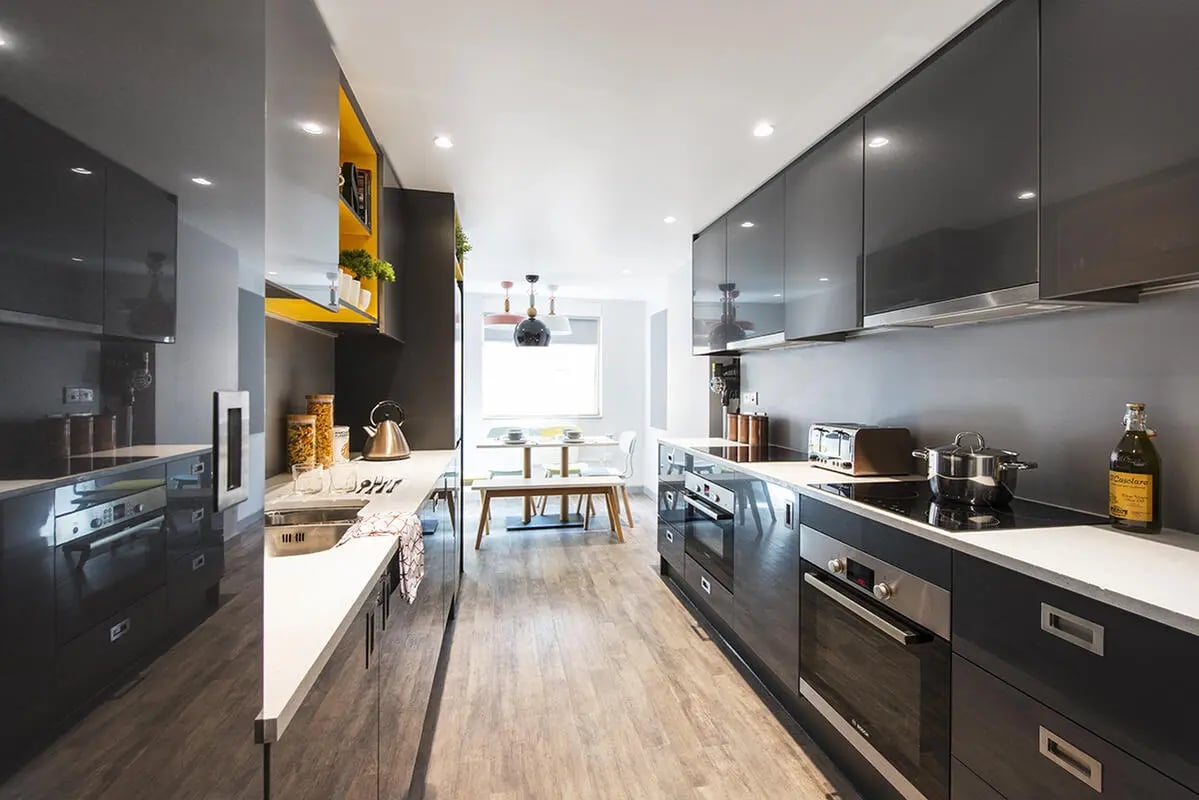 Modern grey kitchen with dining area kitchen at Yugo Therese House in London Student Accommodation