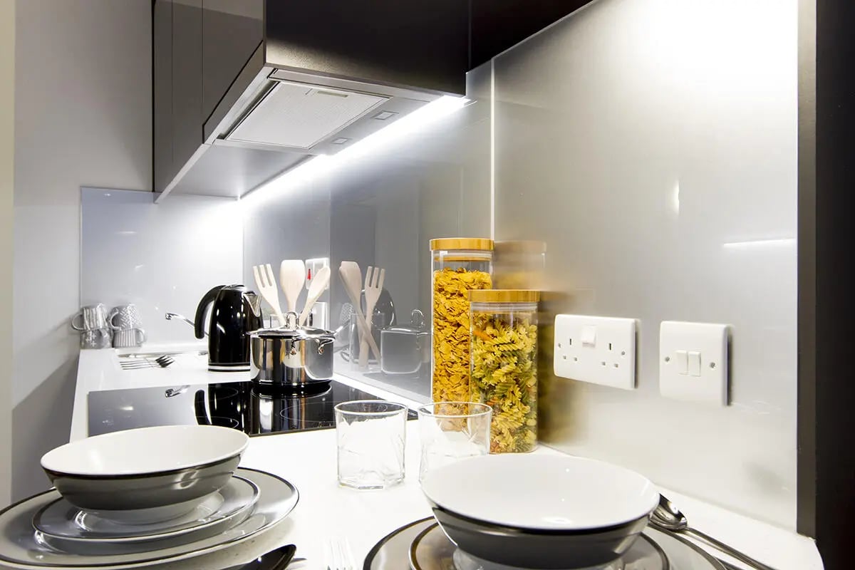 Kettle pots bowls and pasta jars kitchen at Yugo Therese House in London Student Accommodation