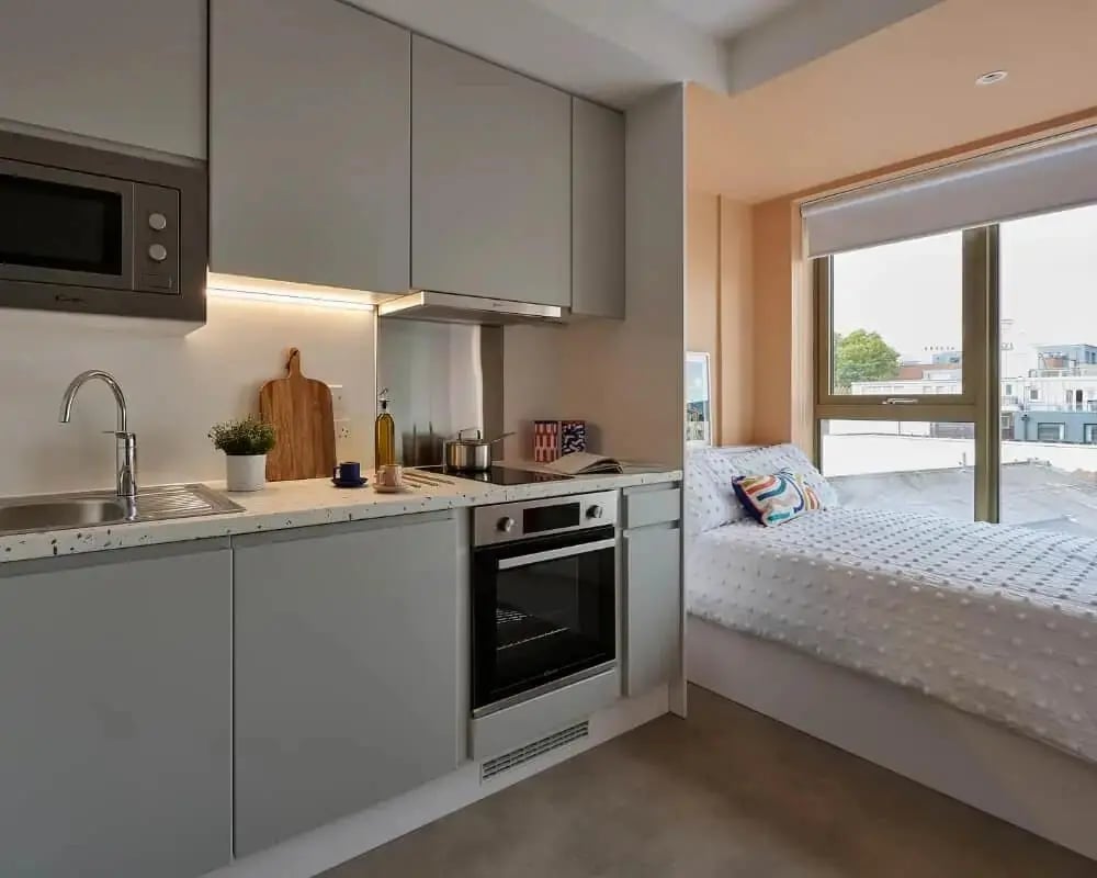 Compact kitchen and bed area student studio at Host View Studios in London Student Accommodation