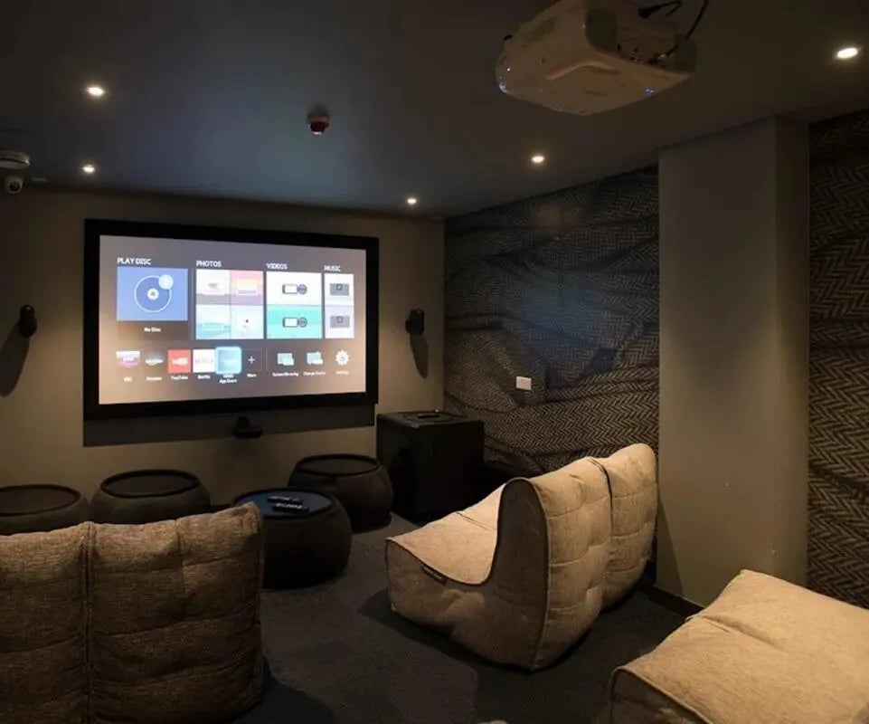 Projector screen beanbags and ottoman entertainment area at McDonald Road in Edinburgh Student Accommodation