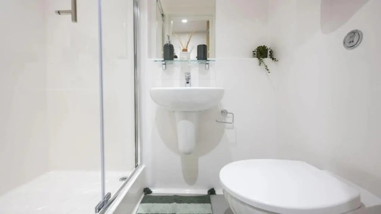 Shower sink and toilet in modern bathroom at Raffles Hall in York Student Accommodation