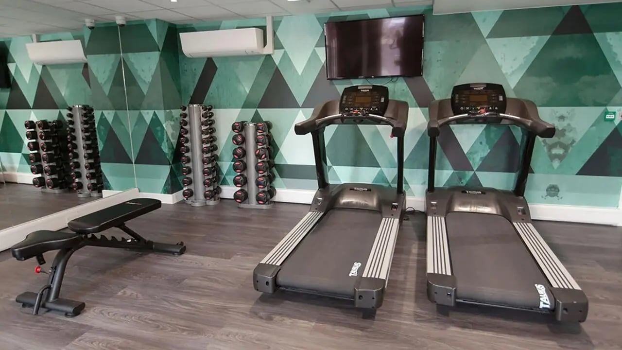 Treadmills weights bench gym at Collegiate Crown Place Portsmouth in Portsmouth Student Accommodation