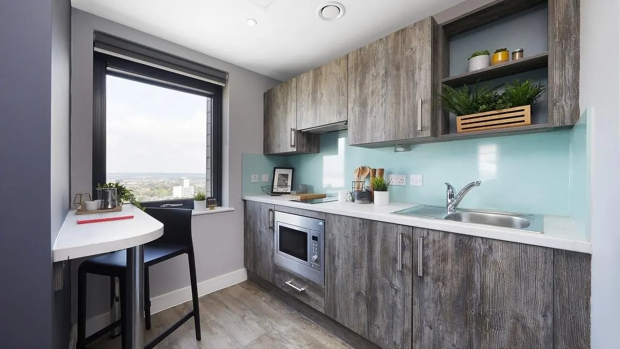 Modern kitchen with breakfast bar and window kitchen at Collegiate Crown Place Portsmouth in Portsmouth Student Accommodation