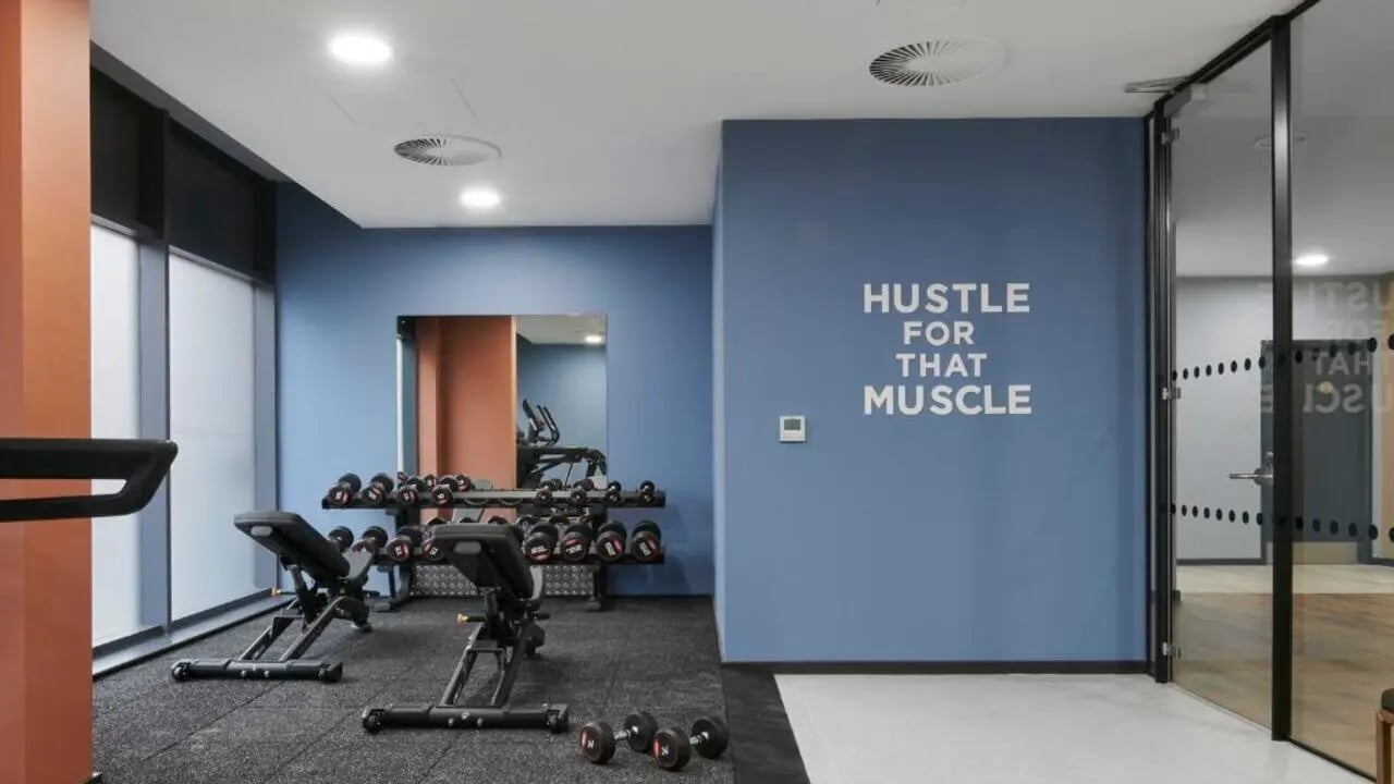 Dumbbells benches treadmill motivational wall gym at Gosford Gate in Coventry Student Accommodation