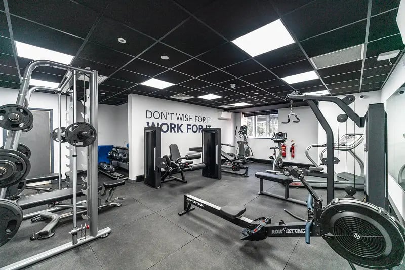 Fitness equipment with weights and rowing machines Gym at AXO Sherbourne Student Village in Coventry Student Accommodation