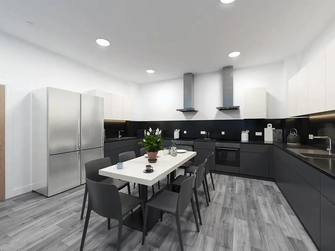 Modern kitchen with dining table and appliances kitchen at Depot Point in London Student Accommodation