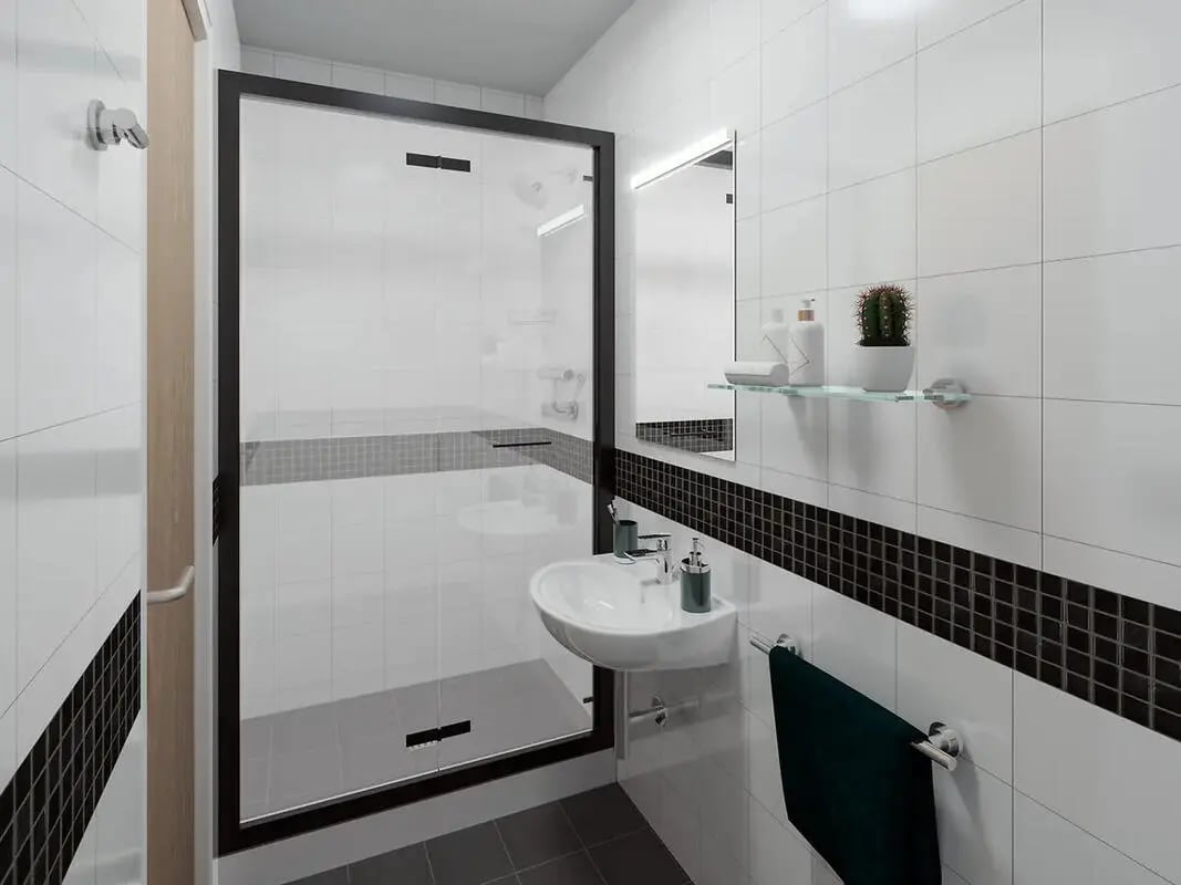 Shower sink mirror towel rack bathroom at Depot Point in London Student Accommodation
