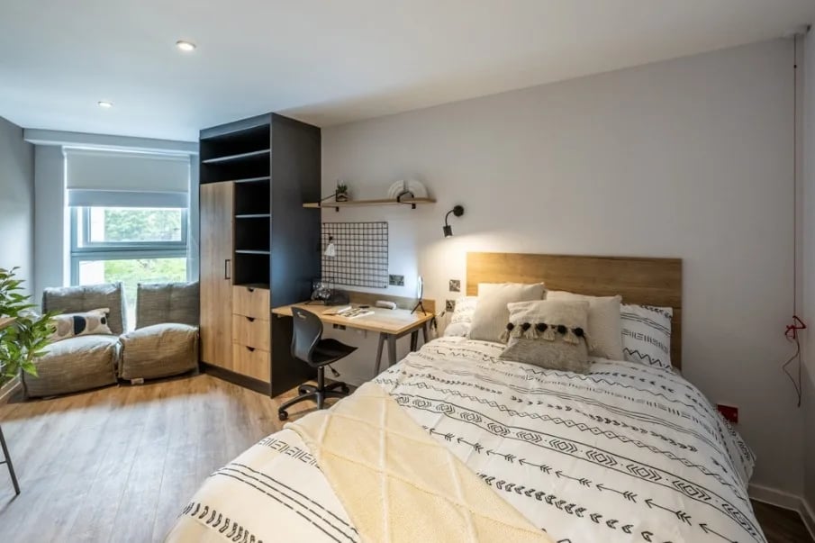 Bed desk wardrobe chairs and plant bedroom at Murieston Crescent - Edinburgh in Edinburgh Student Accommodation