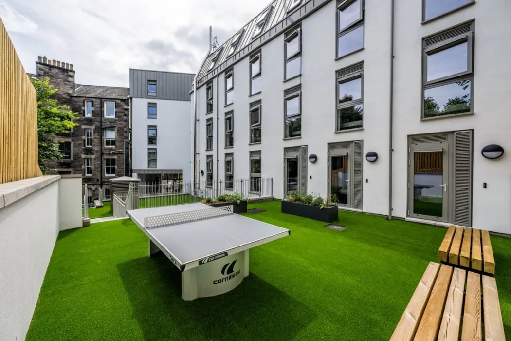 Ping pong table with benches on lawn exterior at Murieston Crescent - Edinburgh in Edinburgh Student Accommodation