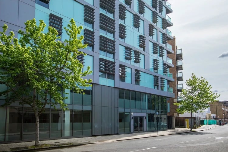 Modern building with trees and balconies exterior at Moonraker Point in London Student Accommodation