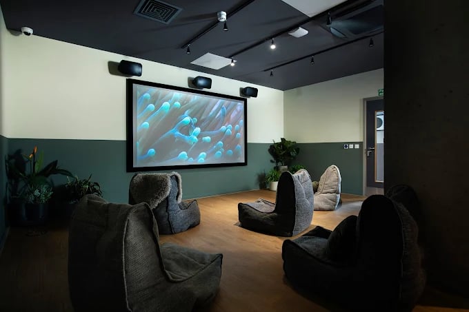 Beanbags and projector screen in cinema room at Campbell House in Bristol Student Accommodation