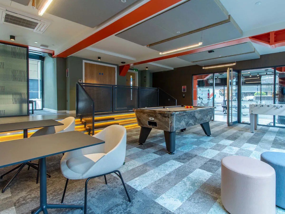 Pool table foosball tables seating common area at The Refinery in Leeds Student Accommodation
