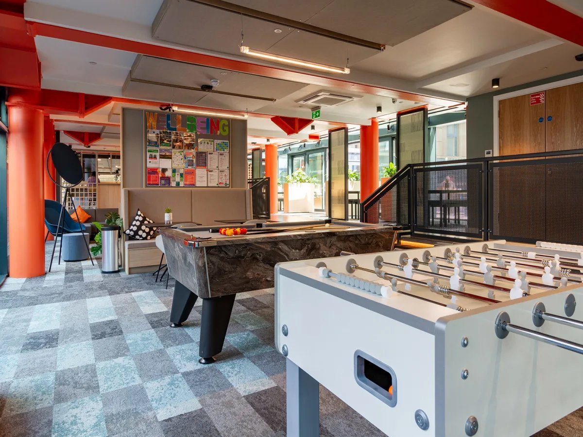 Pool table foosball table lounge area at The Refinery in Leeds Student Accommodation