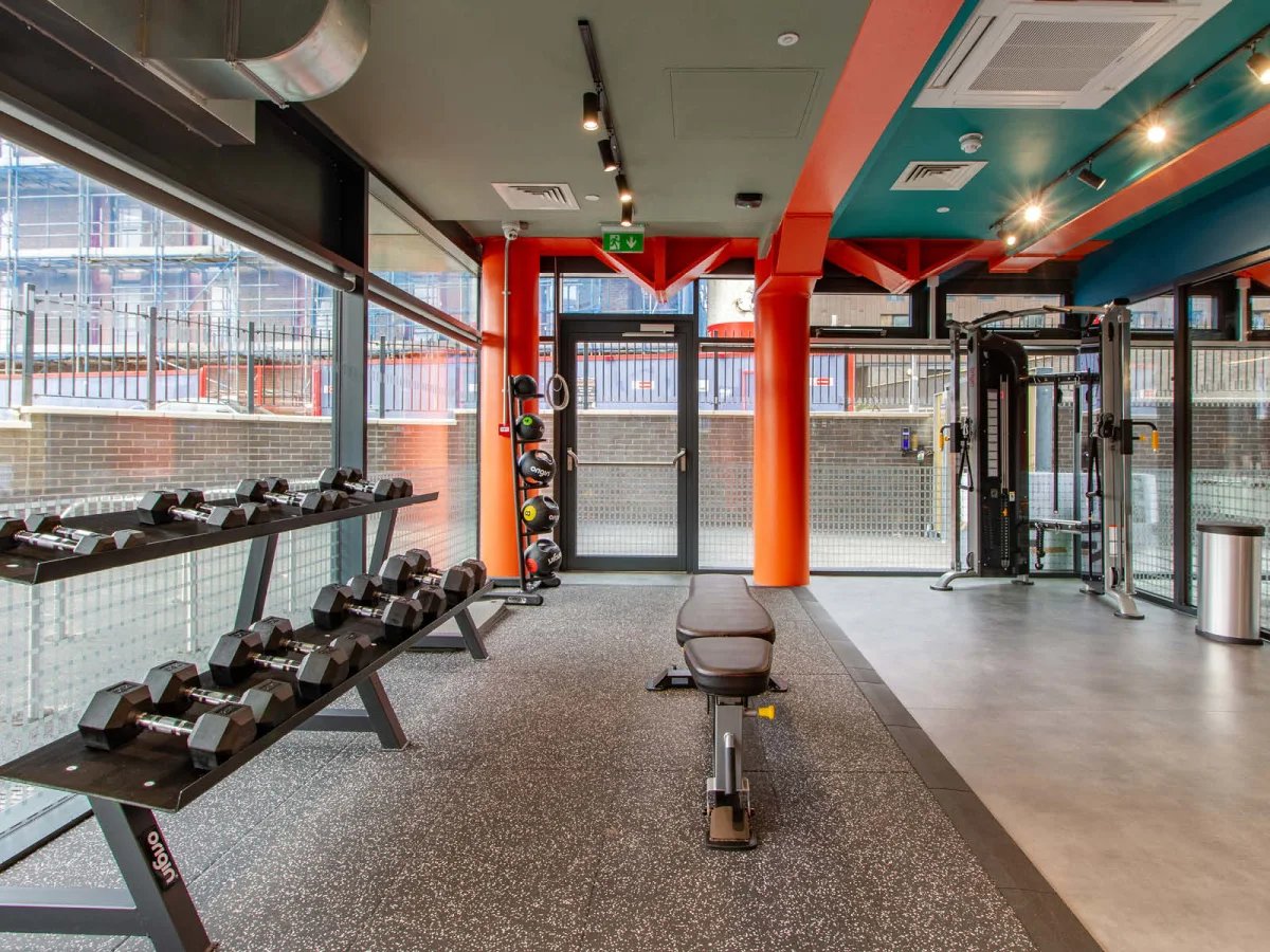 Dumbbells bench and gym equipment Fitness area at The Refinery in Leeds Student Accommodation
