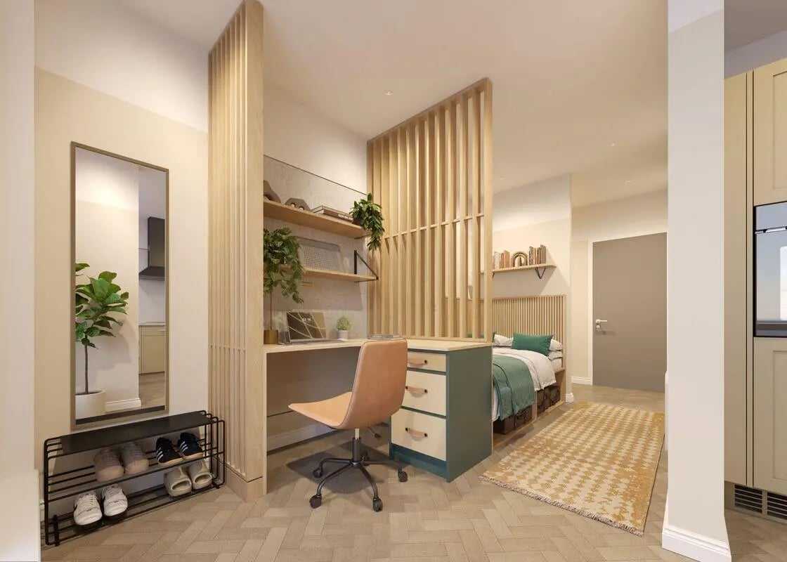 Desk chair bed and shelving unit bedroom at The Exchange in Bath Student Accommodation