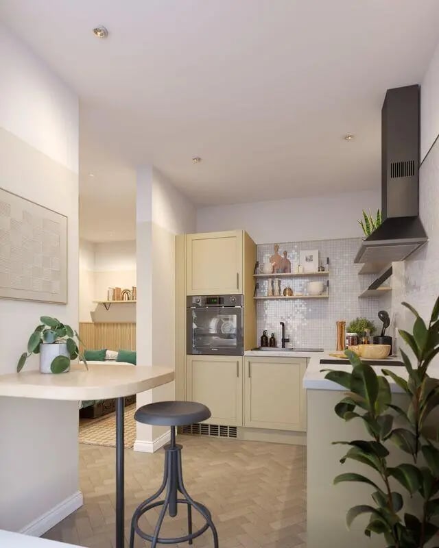 Stool with plants and modern kitchen area kitchen at The Exchange in Bath Student Accommodation