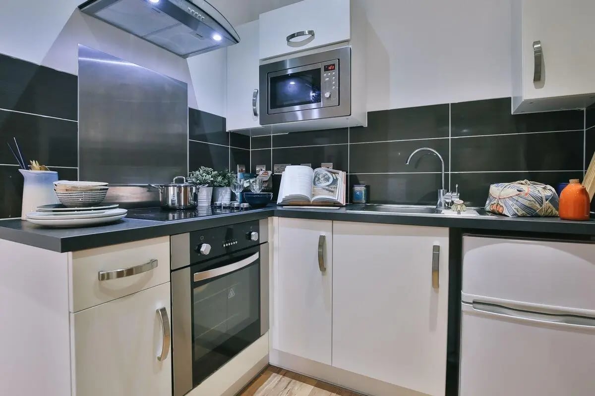Modern student kitchen with microwave oven sink and fridge kitchen at 136 New Walk Leicester in Leicester Student Accommodation