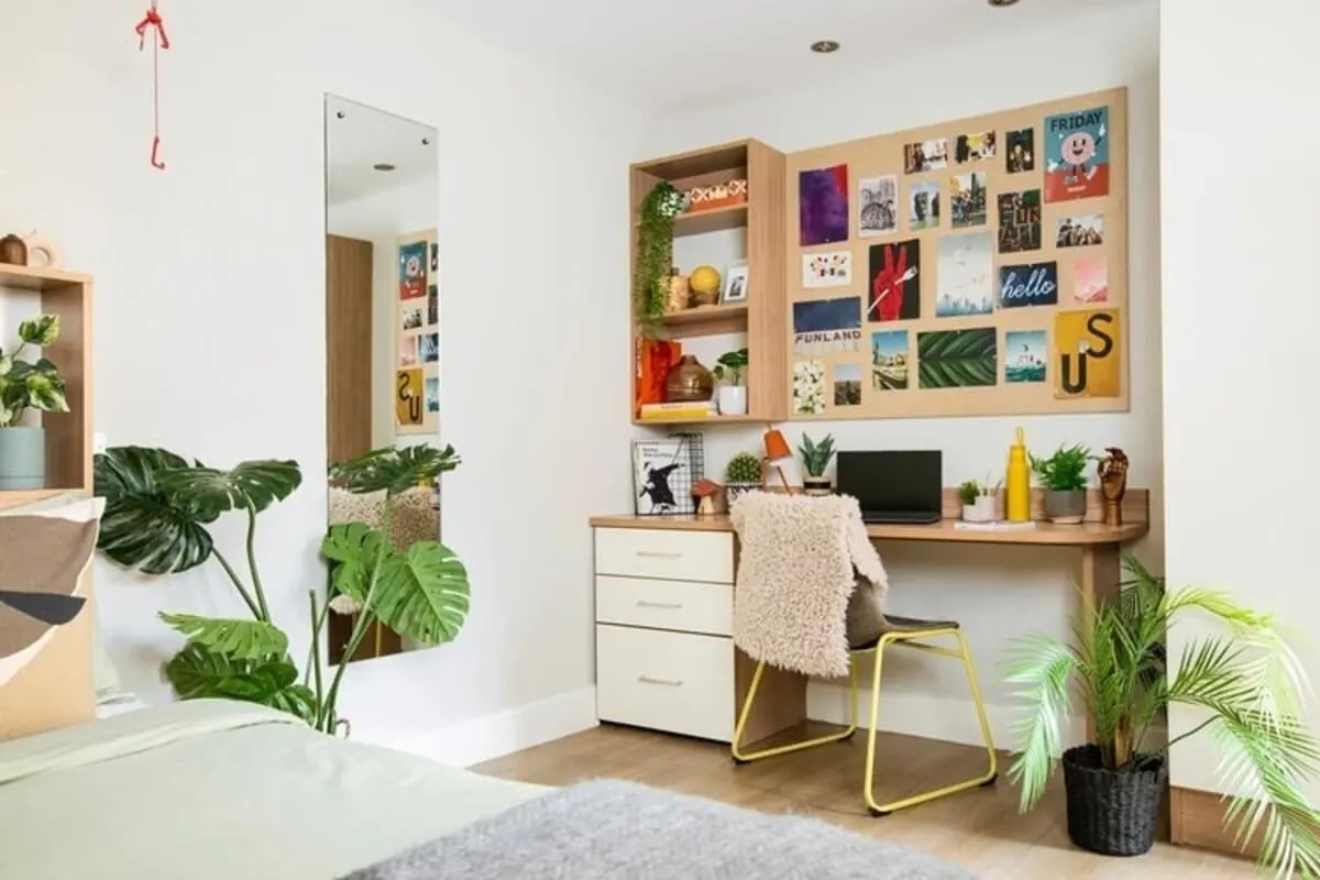 Desk plants mirror and bulletin board study area at Kelvin Court in Glasgow Student Accommodation