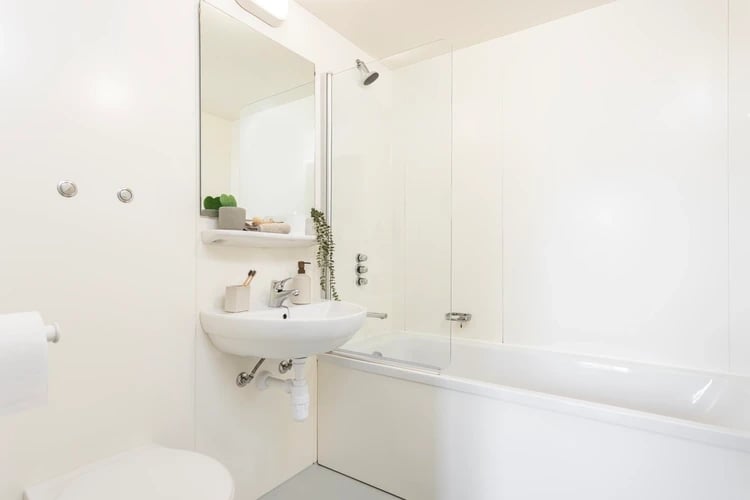 Sink mirror toilet bathtub and shower bathroom at Chalmers Street in Edinburgh Student Accommodation