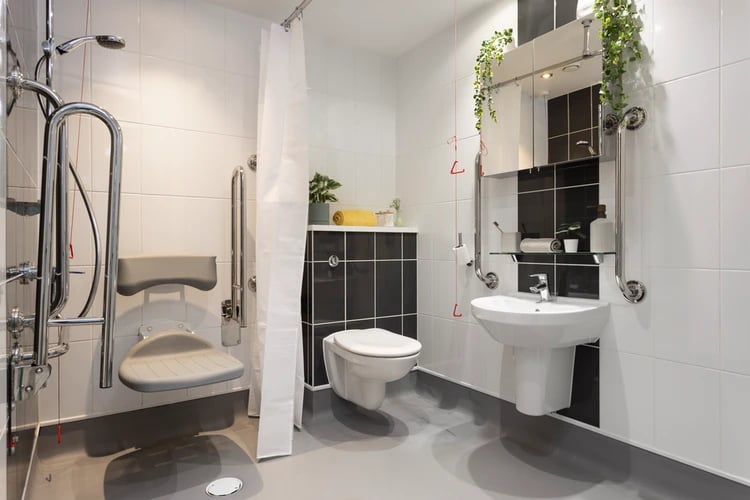 Shower seat toilet sink grab bars bathroom at Salisbury court in Edinburgh Student Accommodation