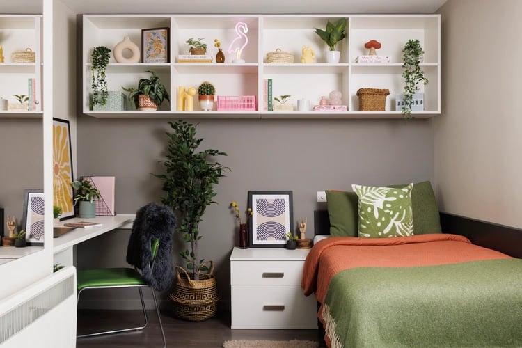 Bed desk and shelves with decor bedroom at Salisbury court in Edinburgh Student Accommodation