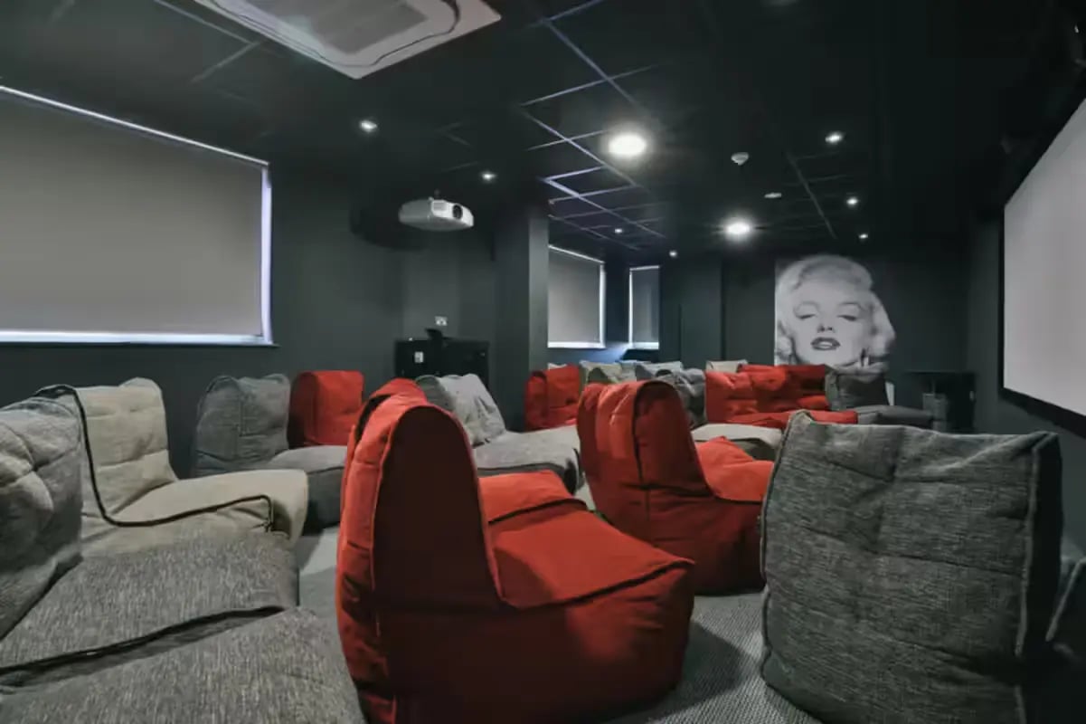 Beanbag chairs and projector in cinema room at Europa House in Portsmouth Student Accommodation