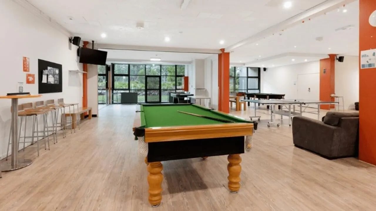 Pool table ping pong tables lounge area common room at La Trobe University - Menzies College in Melbourne Student Accommodation
