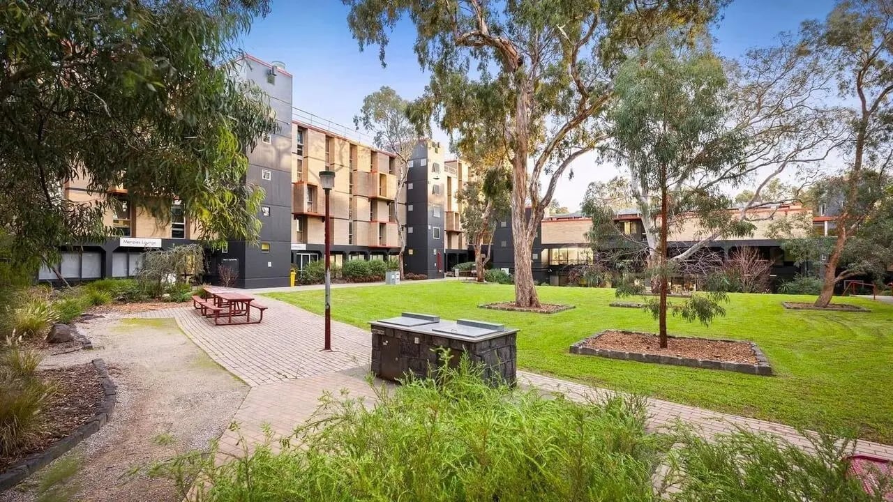 Buildings picnic table barbecue and grass exterior at La Trobe University - Menzies College in Melbourne Student Accommodation