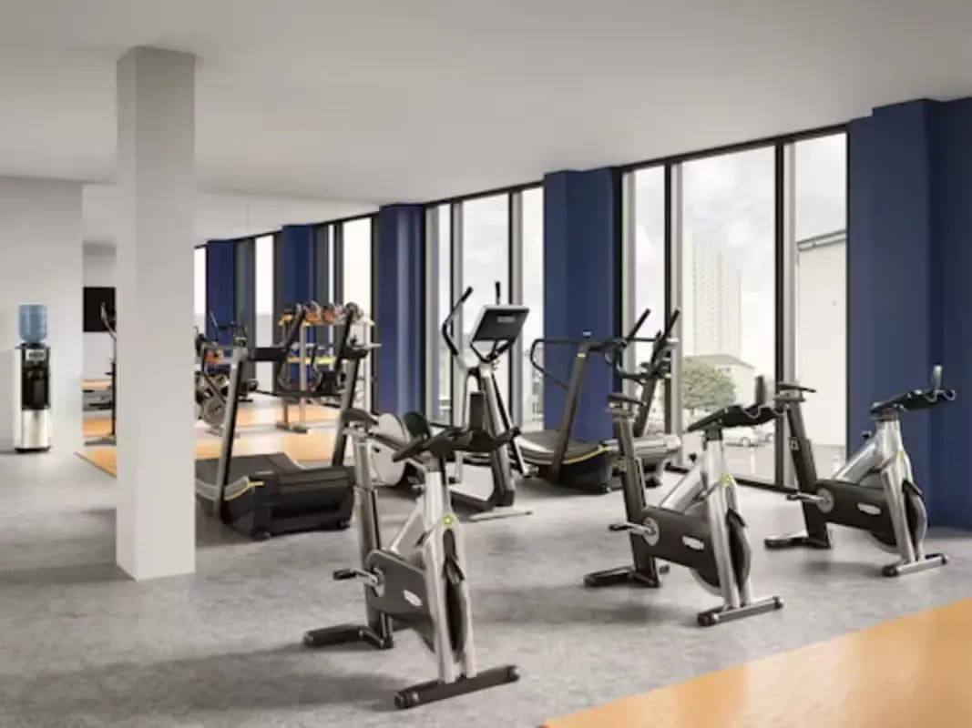 Gym with treadmills ellipticals and exercise bikes fitness center at St Mungo's in Glasgow Student Accommodation