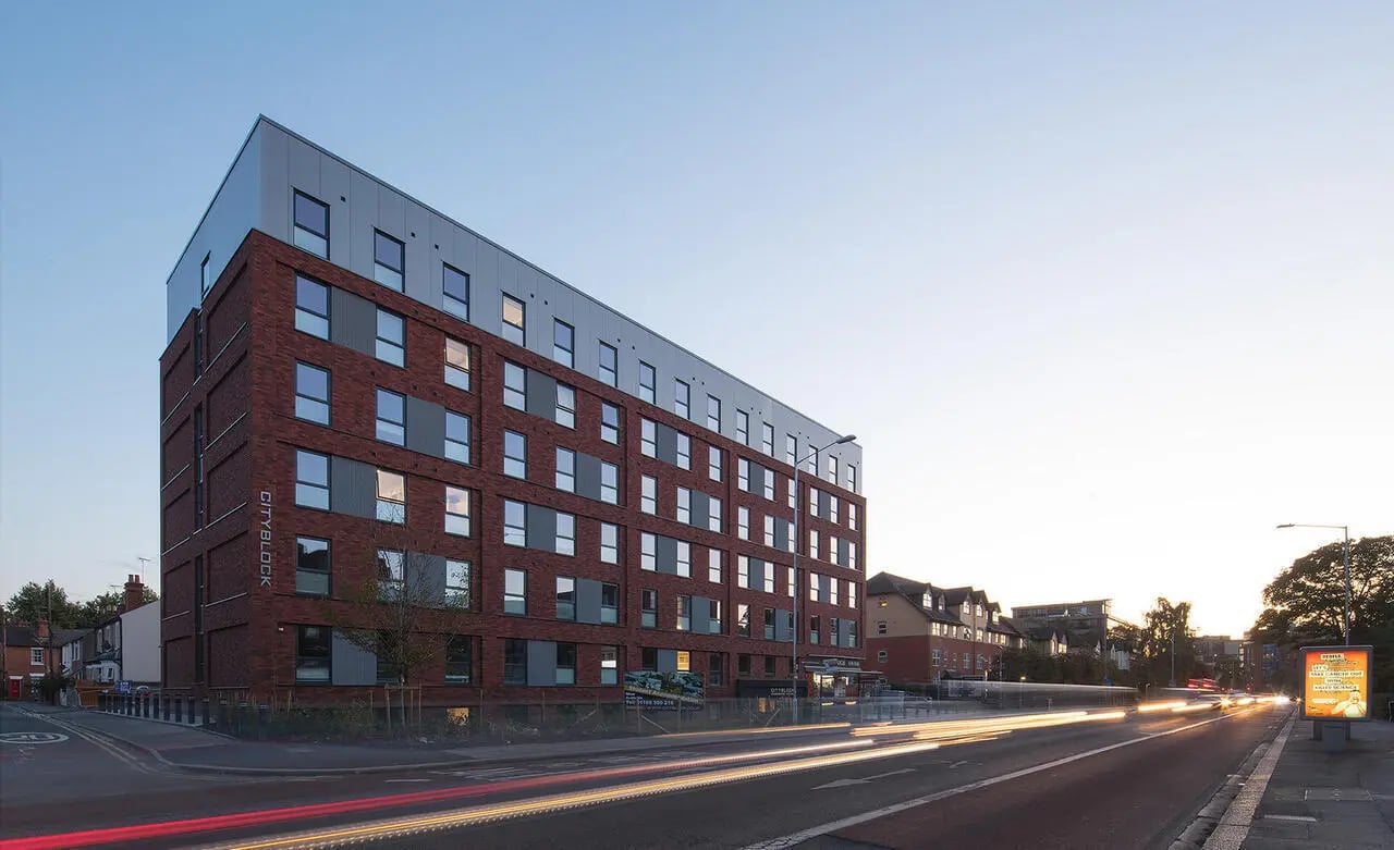 Red brick building with many windows exterior at Berkshire House Reading in Reading Student Accommodation