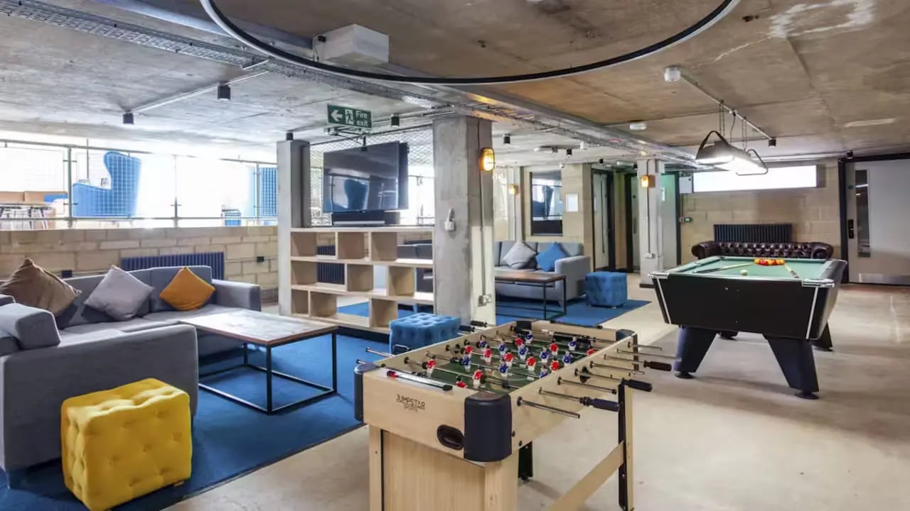 Pool table foosball couches and television common room at Berkshire House Reading in Reading Student Accommodation