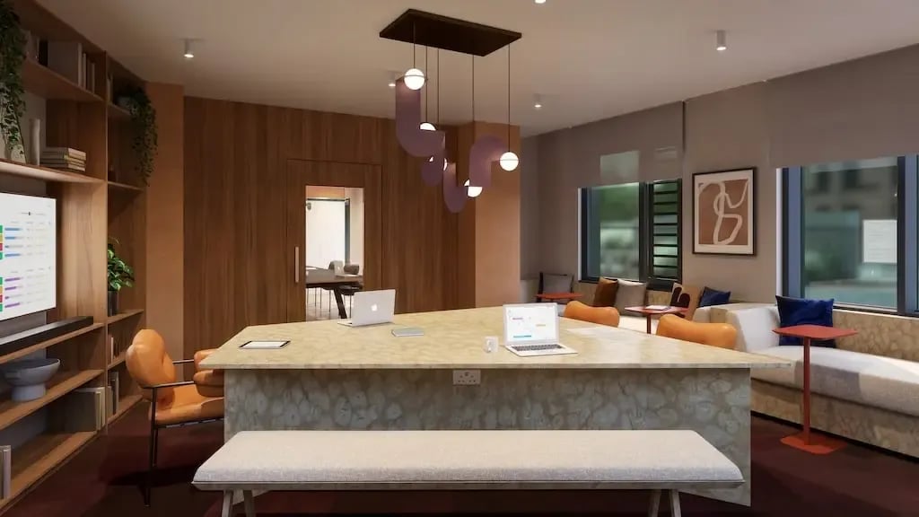 Lounge area with laptops and seating at Ironworks House in London Student Accommodation