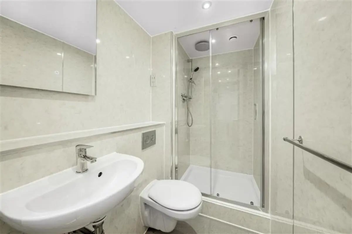 Sink toilet shower unit with chrome fixtures bathroom at Cathedral Park in Bristol Student Accommodation