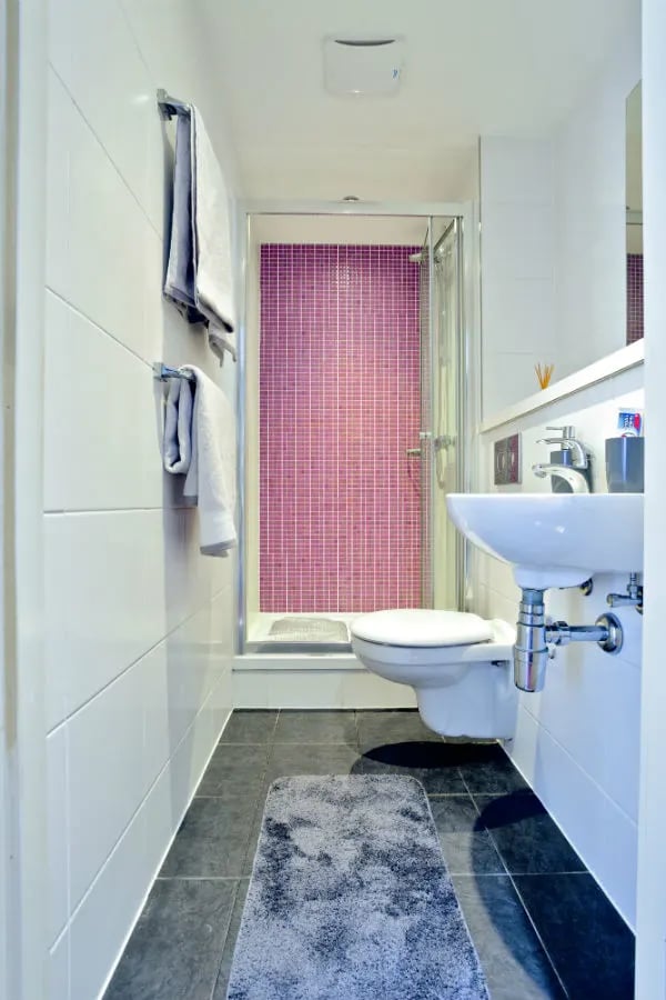 Shower toilet sink rug bathroom at Griffon Studios in London Student Accommodation